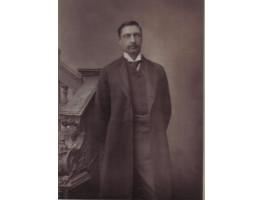 Portrait Photograph of Rider Haggard. Three Quarter Length, standing by staircase, by Herbert Rose Barraud [1845-1896].