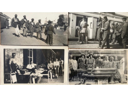 Collection of 23 black and white photographs, three of Turkish and Indian wounded at station arriving from Suez canal, (inscribed on reverse), military band, army processions, one including armoured car, operating table, wounded in ward and on terrace, Ma